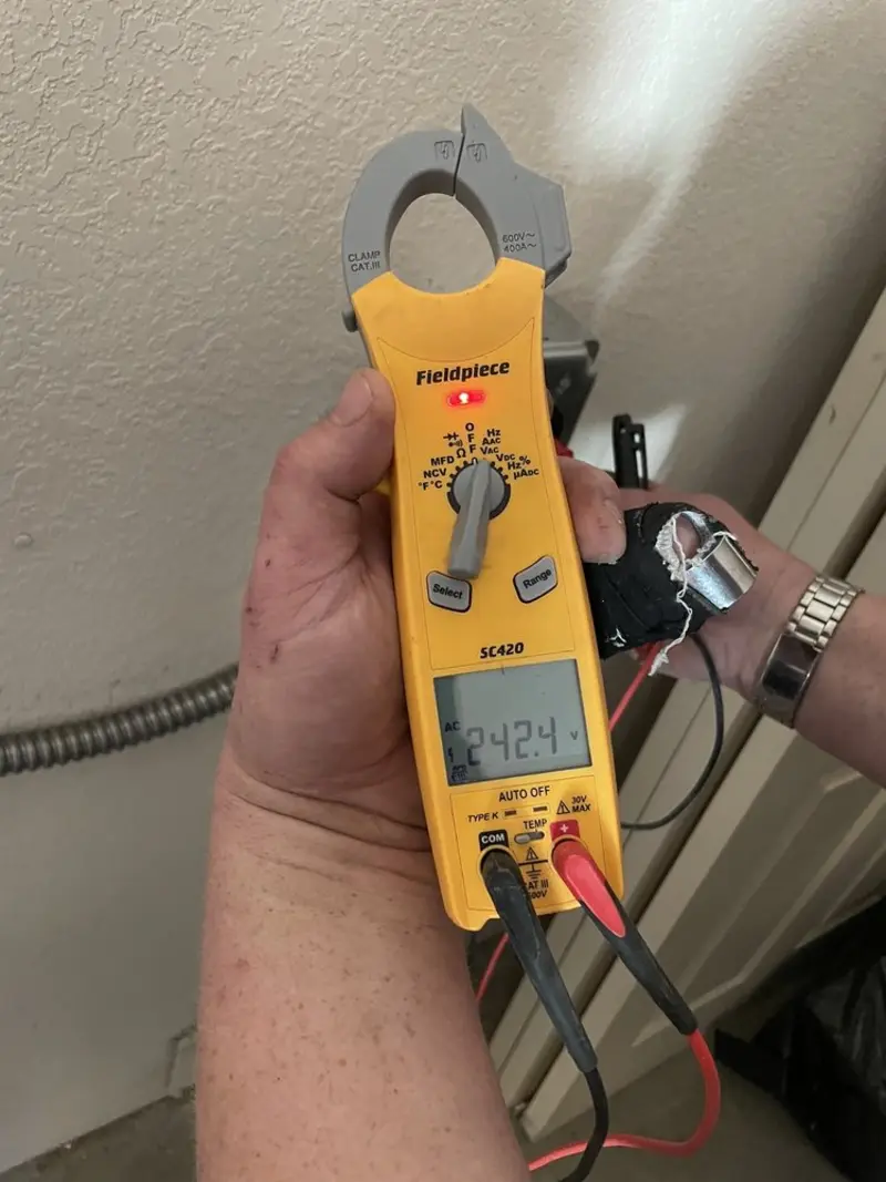 Voltage testing with clamp meter during Generator Installation in Southgate